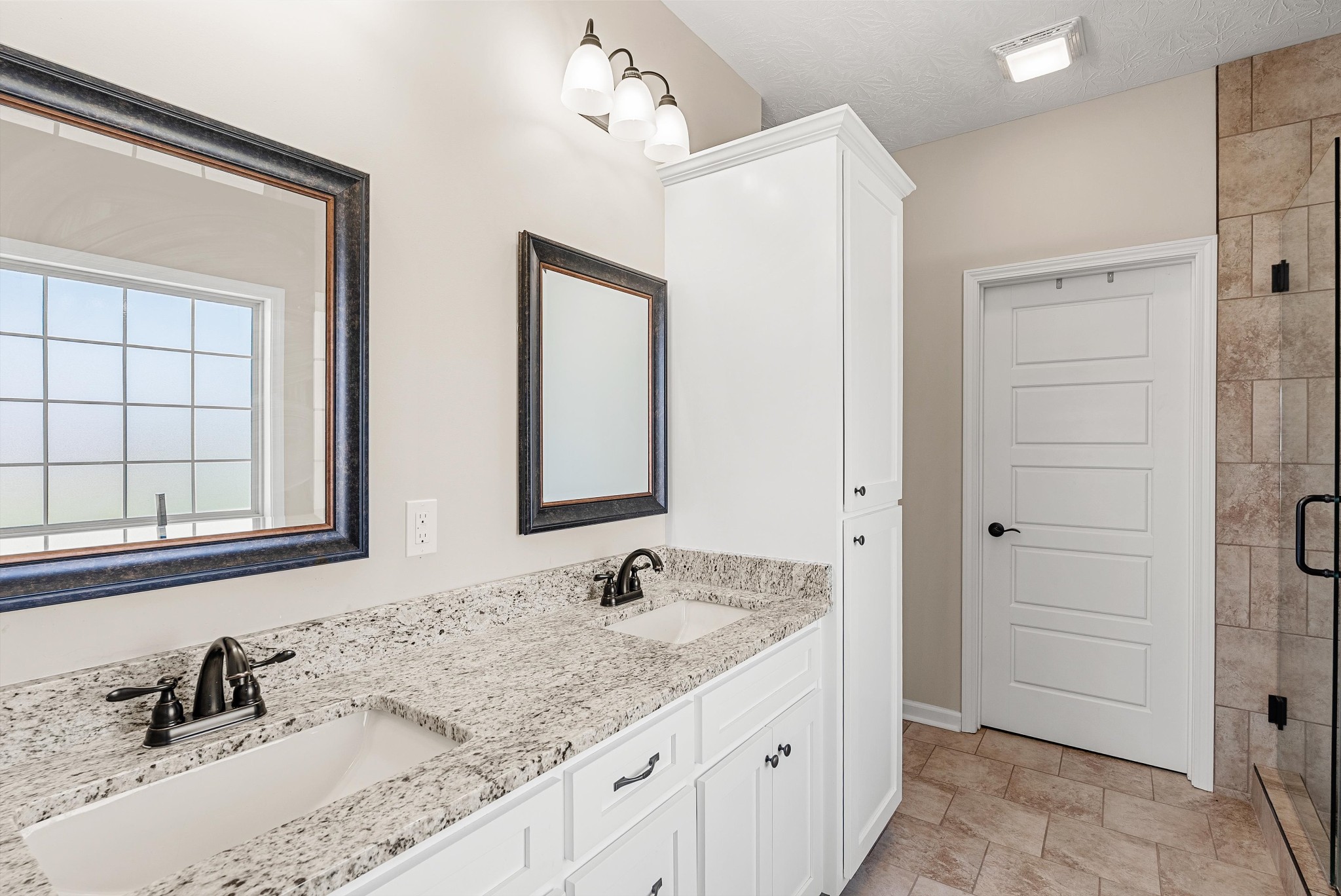 57 Cheney Lane Lafayette, TN 37083 - Photo 17 of 35 a bathroom with a granite countertop sink and a mirror
