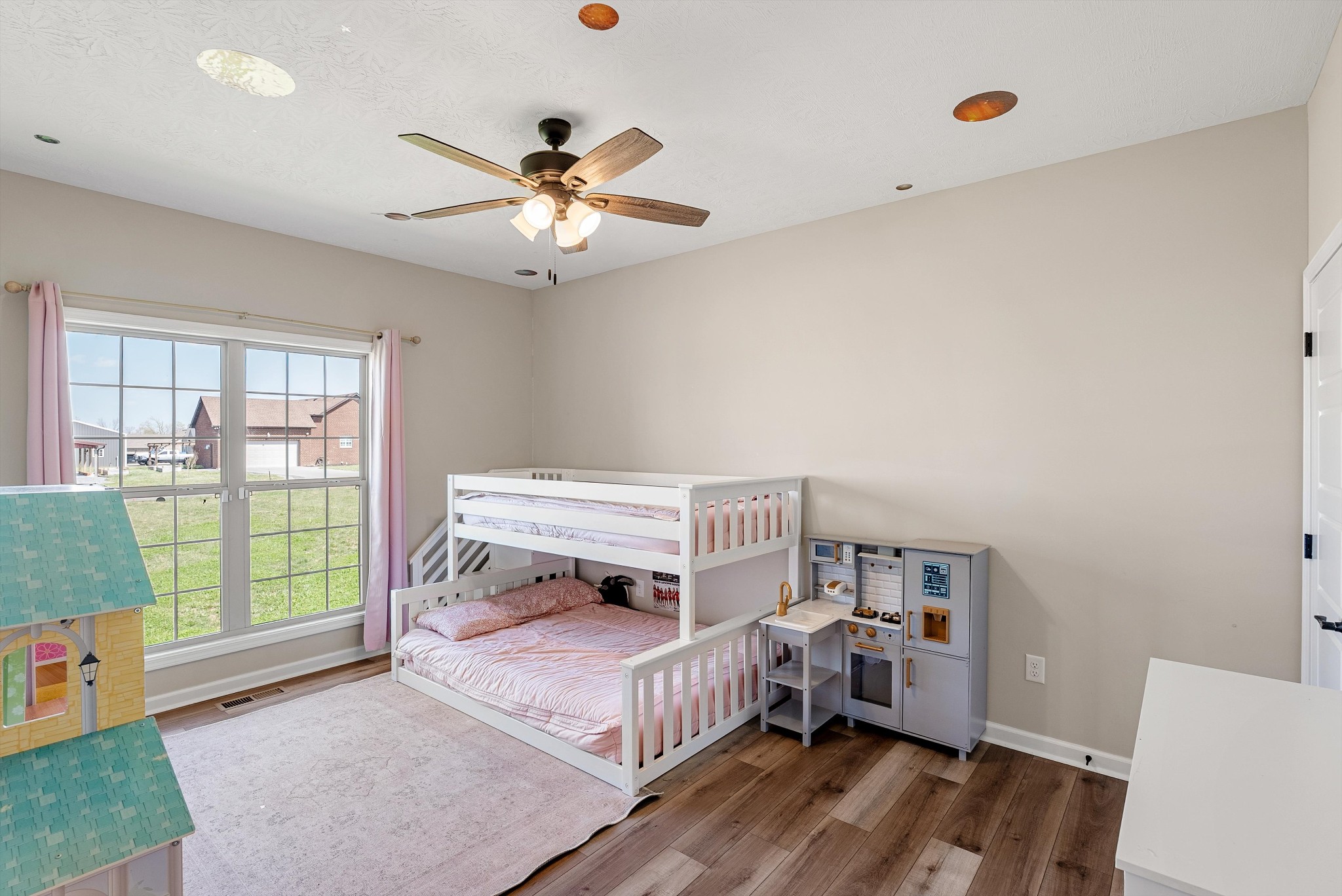57 Cheney Lane Lafayette, TN 37083 - Photo 20 of 35 a bedroom with a bed and wooden floor
