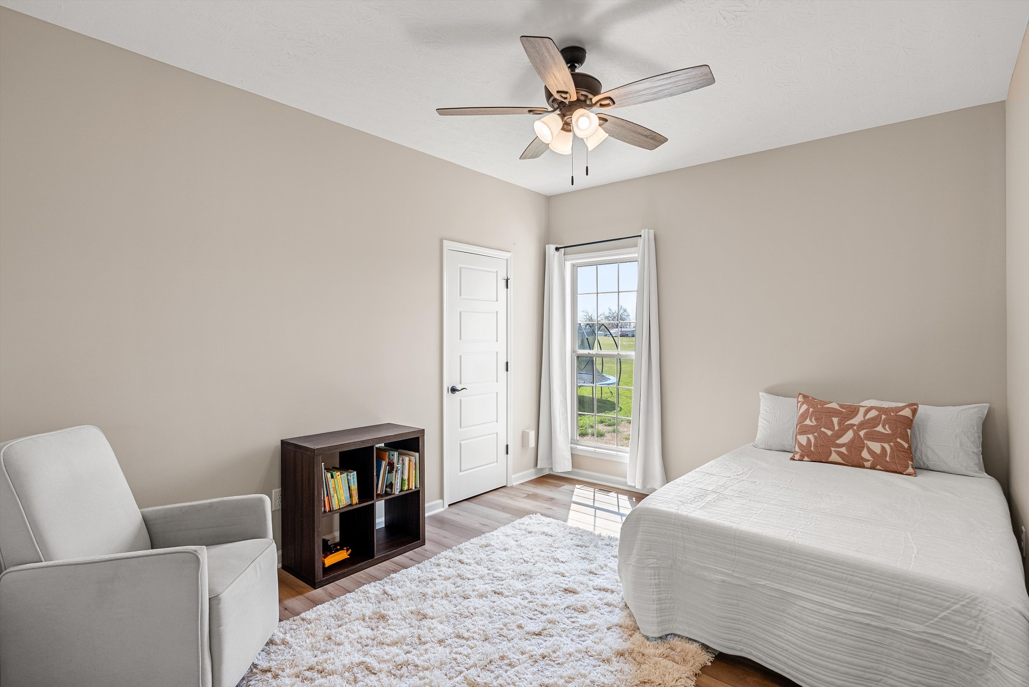 57 Cheney Lane Lafayette, TN 37083 - Photo 22 of 35 a bedroom with a bed and a couch