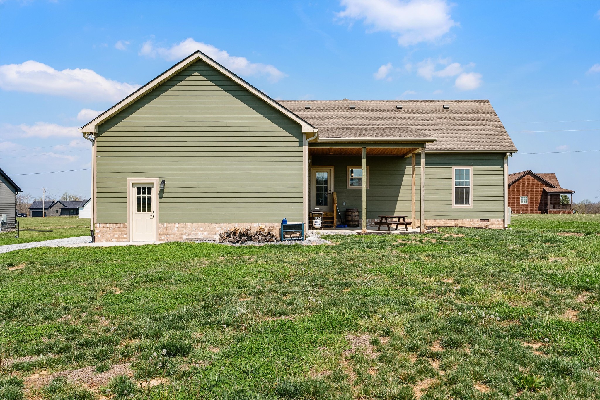 57 Cheney Lane Lafayette, TN 37083 - Photo 26 of 35 a view of a house with backyard