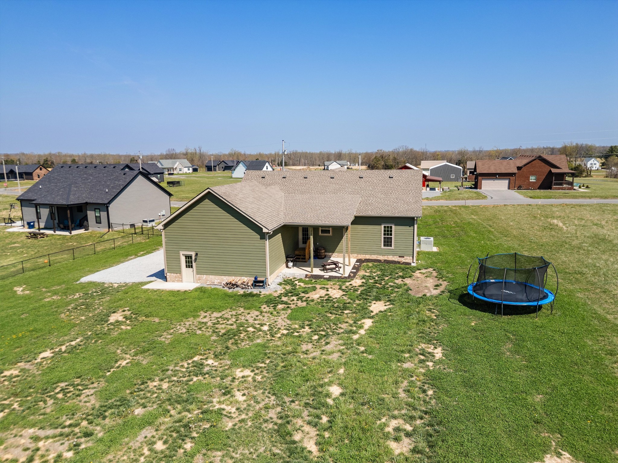 57 Cheney Lane Lafayette, TN 37083 - Photo 31 of 35 an aerial view of a house with swimming pool garden and mountain view in back