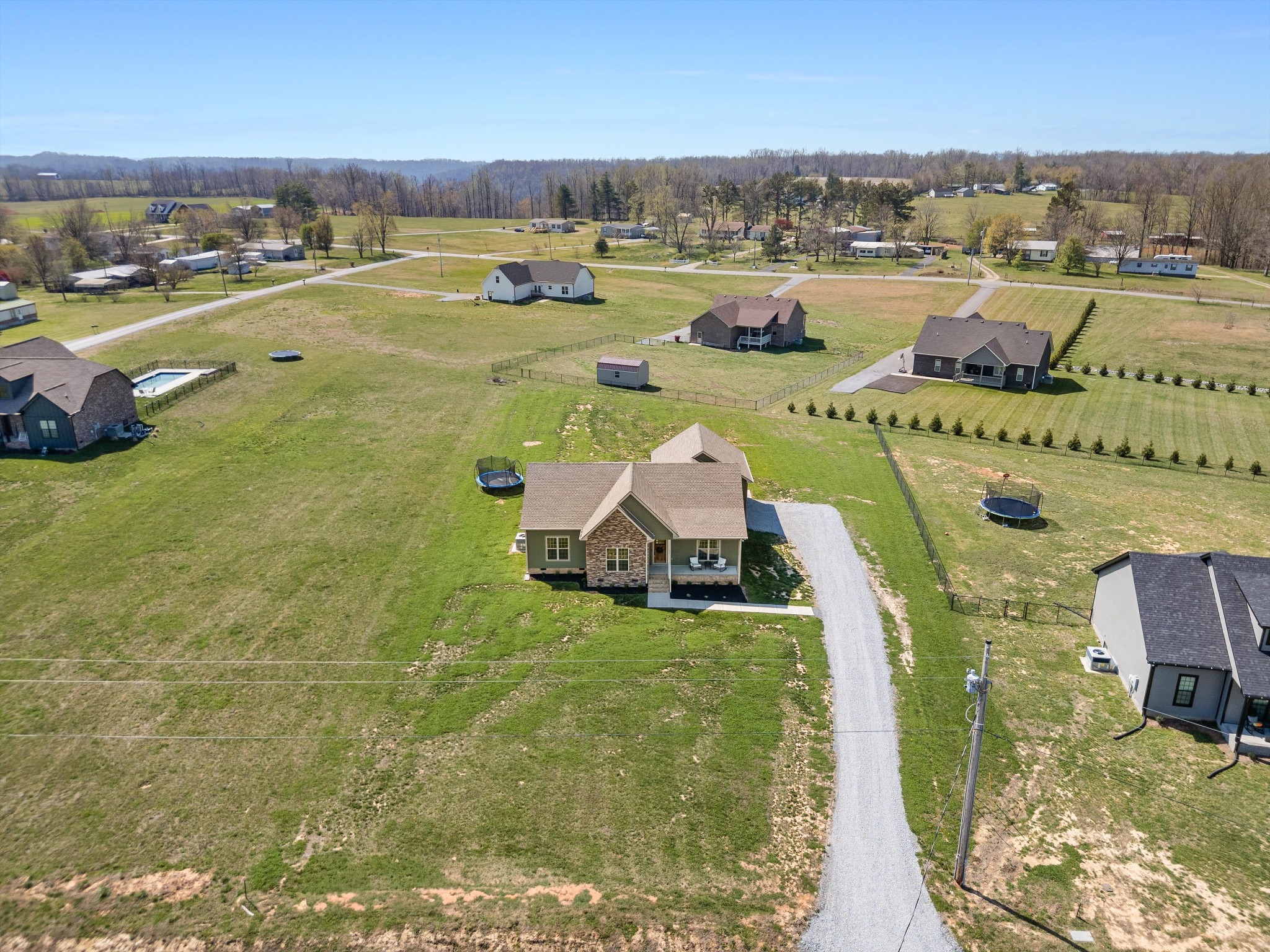 57 Cheney Lane Lafayette, TN 37083 - Photo 34 of 35 an aerial view of a house with big yard
