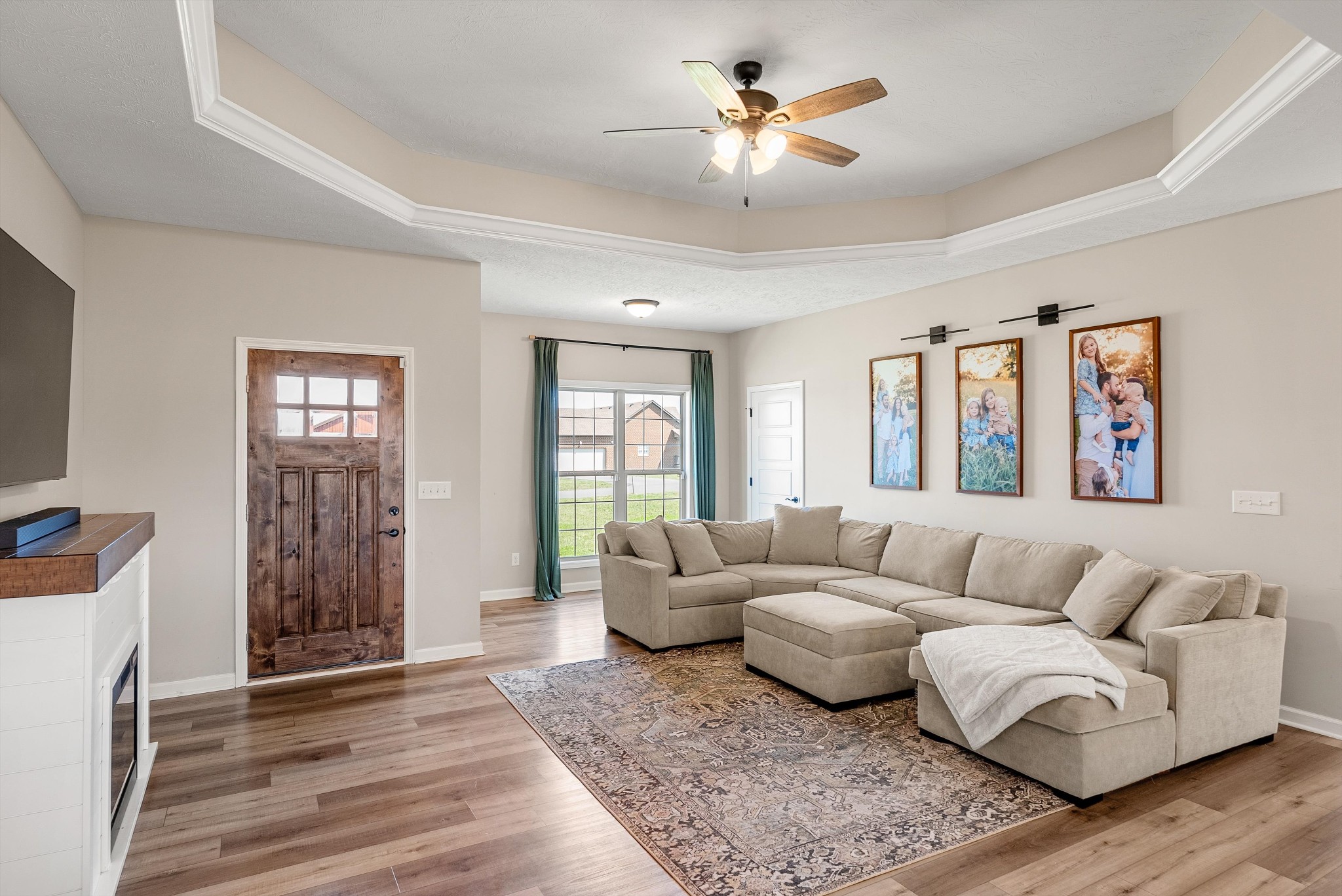 57 Cheney Lane Lafayette, TN 37083 - Photo 5 of 35 a living room with furniture ceiling fan and a window