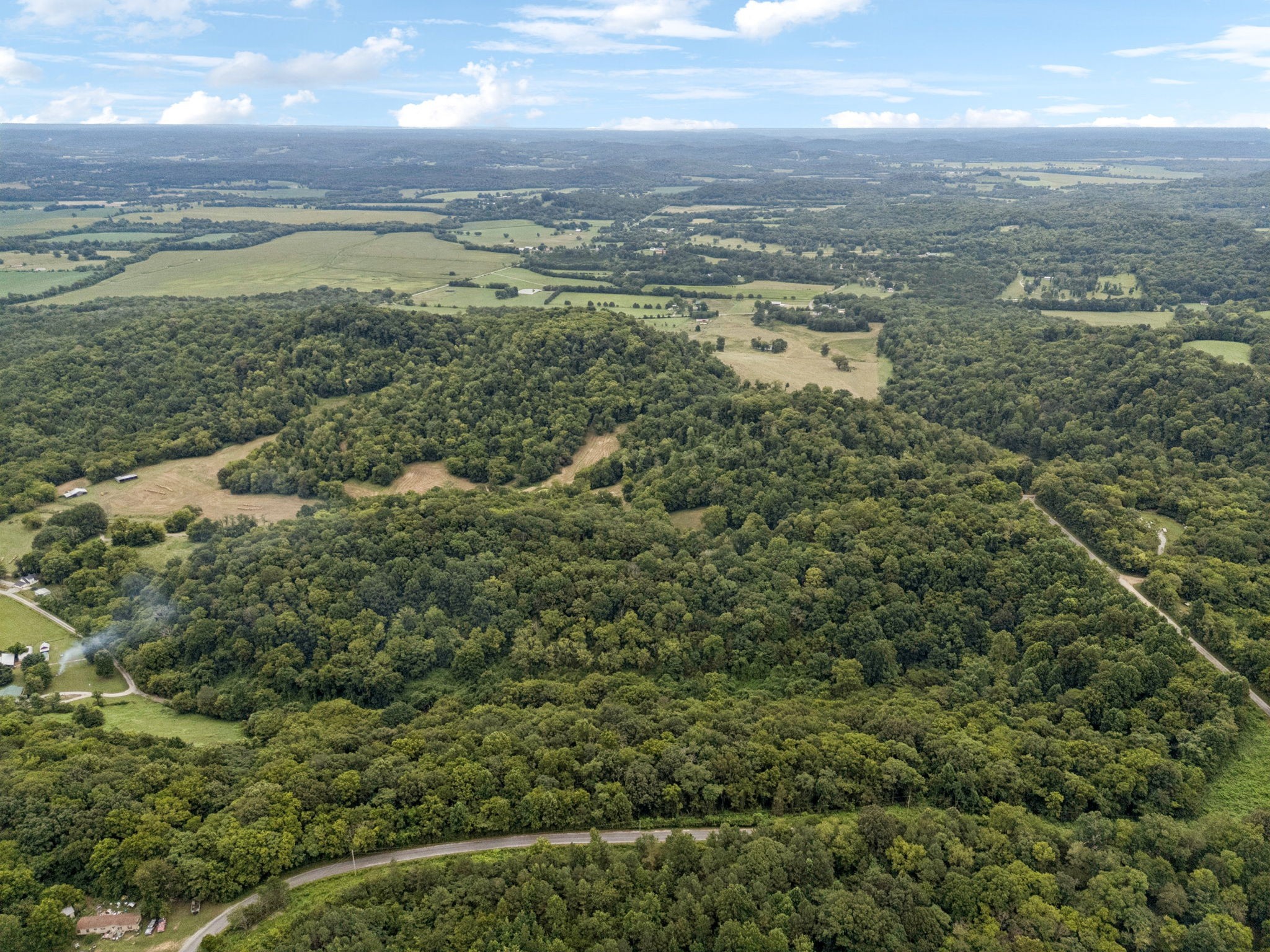 8 Crooked Hill Road Pulaski, TN 38478 - Photo 16 of 26 a view of a lake with a city