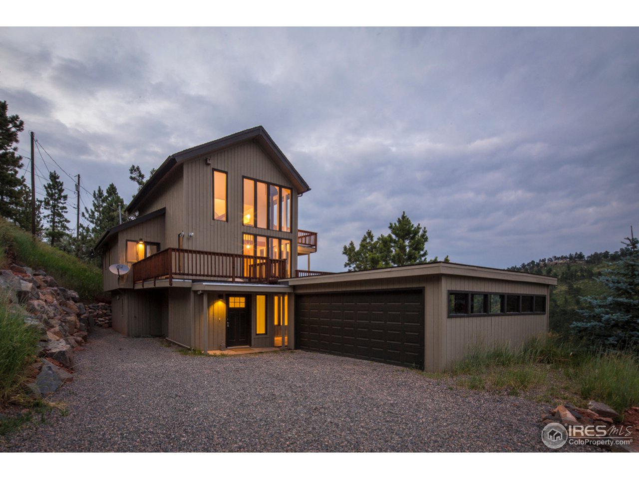 6438 Red Hill Road Boulder, CO 80302 - Photo 1 of 16 a front view of a house with a yard