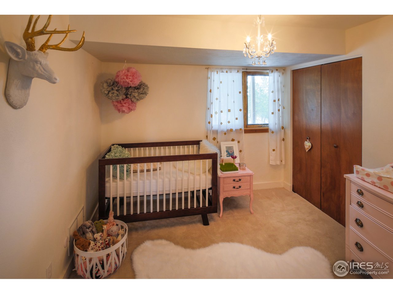 6438 Red Hill Road Boulder, CO 80302 - Photo 15 of 16 a bedroom with furniture and a window