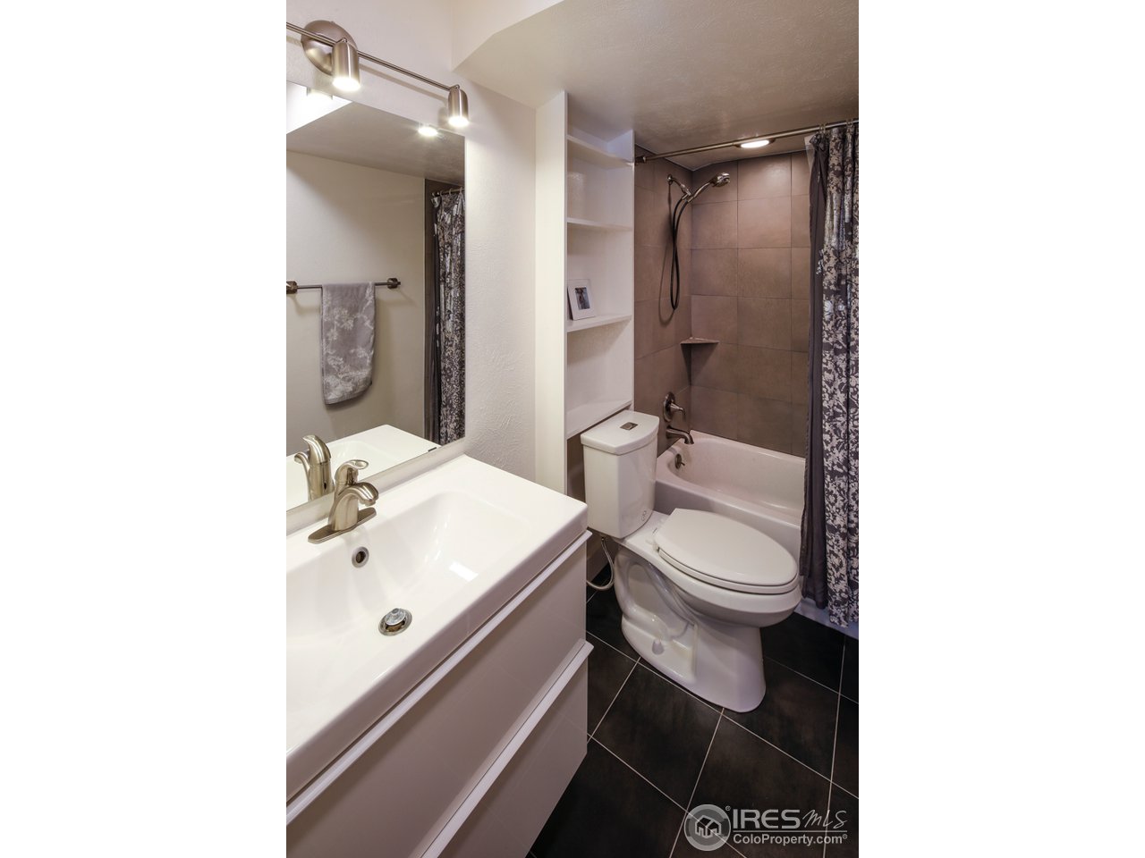 6438 Red Hill Road Boulder, CO 80302 - Photo 16 of 16 a bathroom with a sink toilet and shower