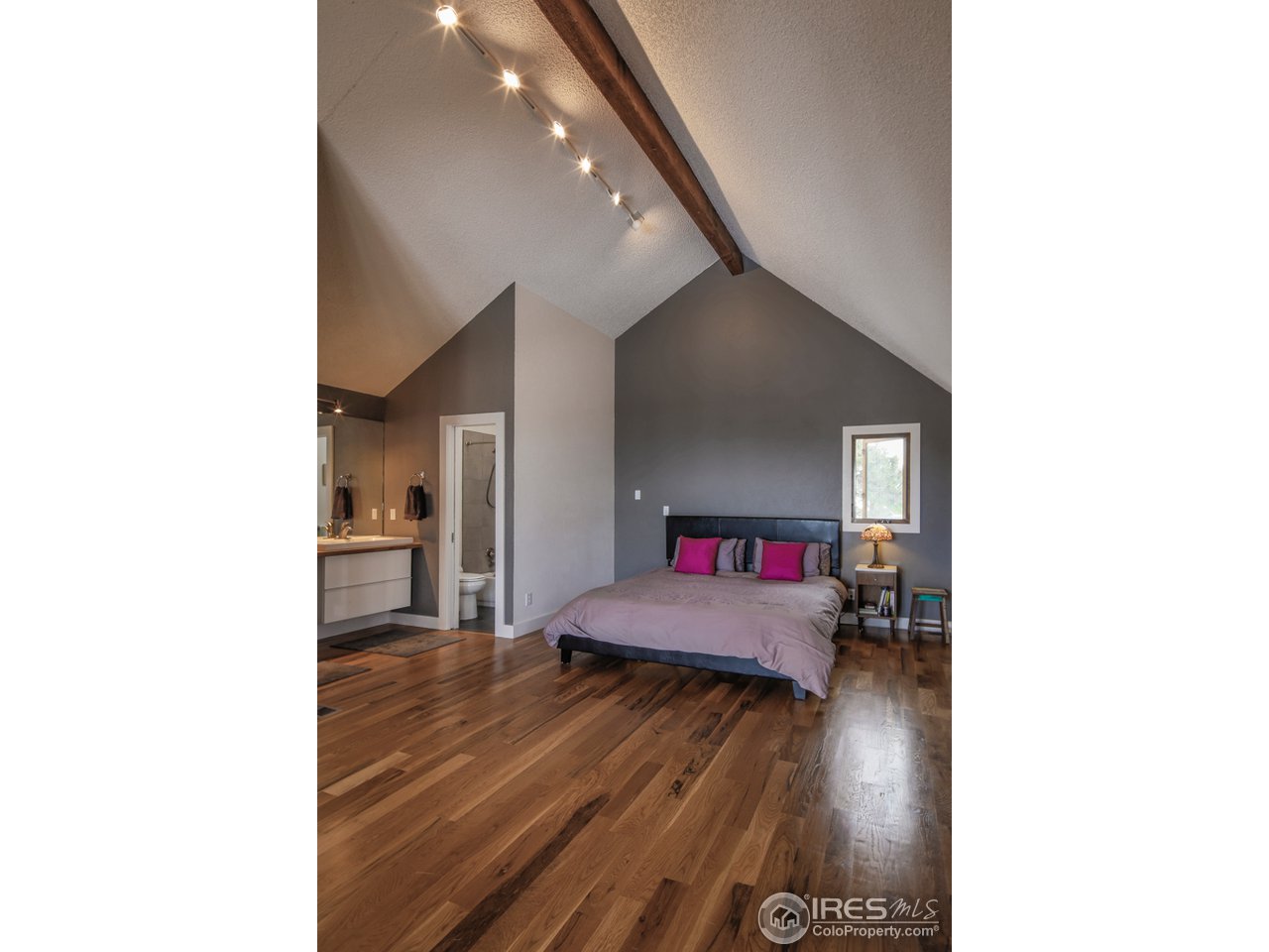 6438 Red Hill Road Boulder, CO 80302 - Photo 5 of 16 a living room with furniture and a wooden floor