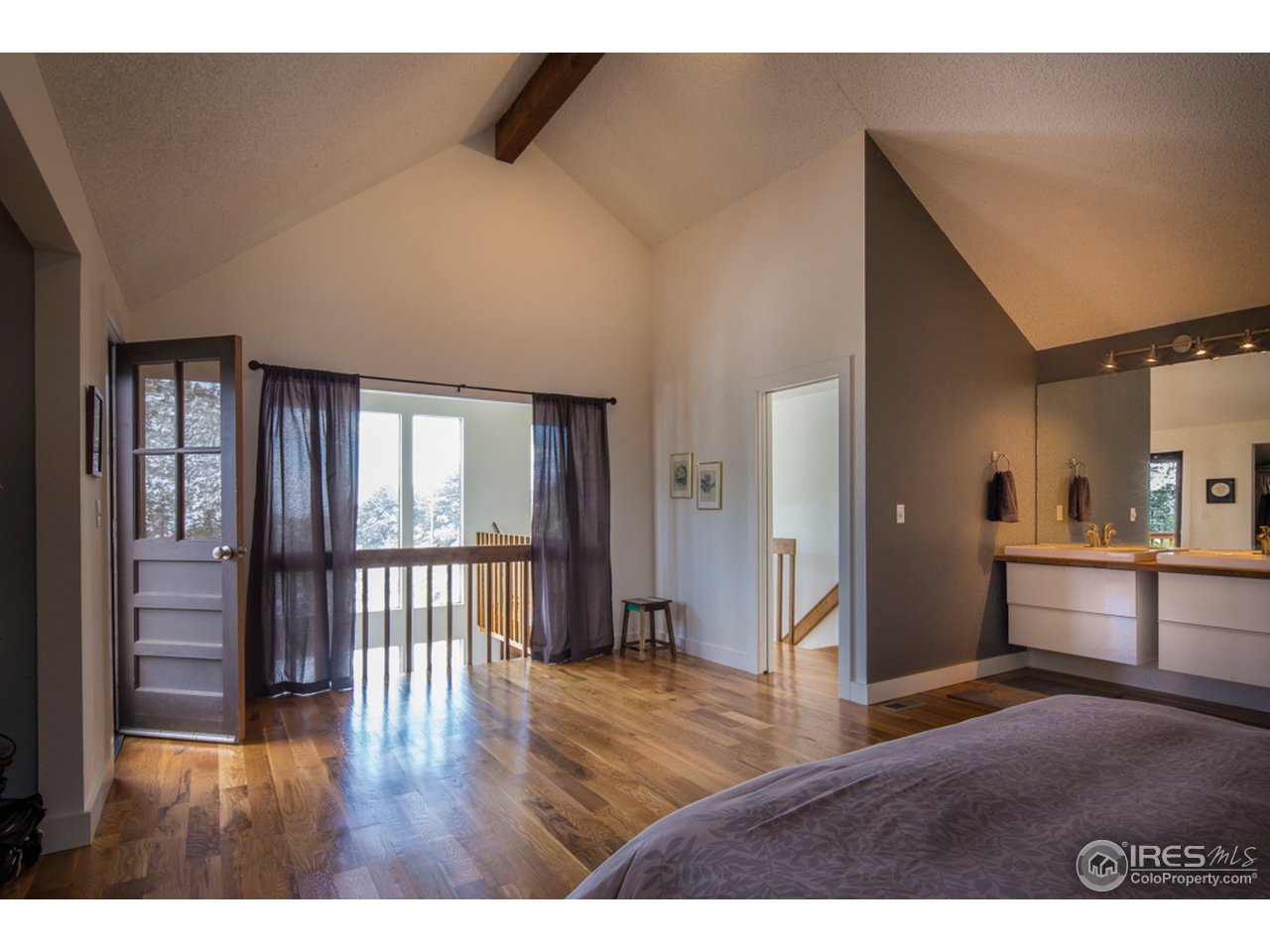 6438 Red Hill Road Boulder, CO 80302 - Photo 6 of 16 a view interior of a house wooden floor and windows