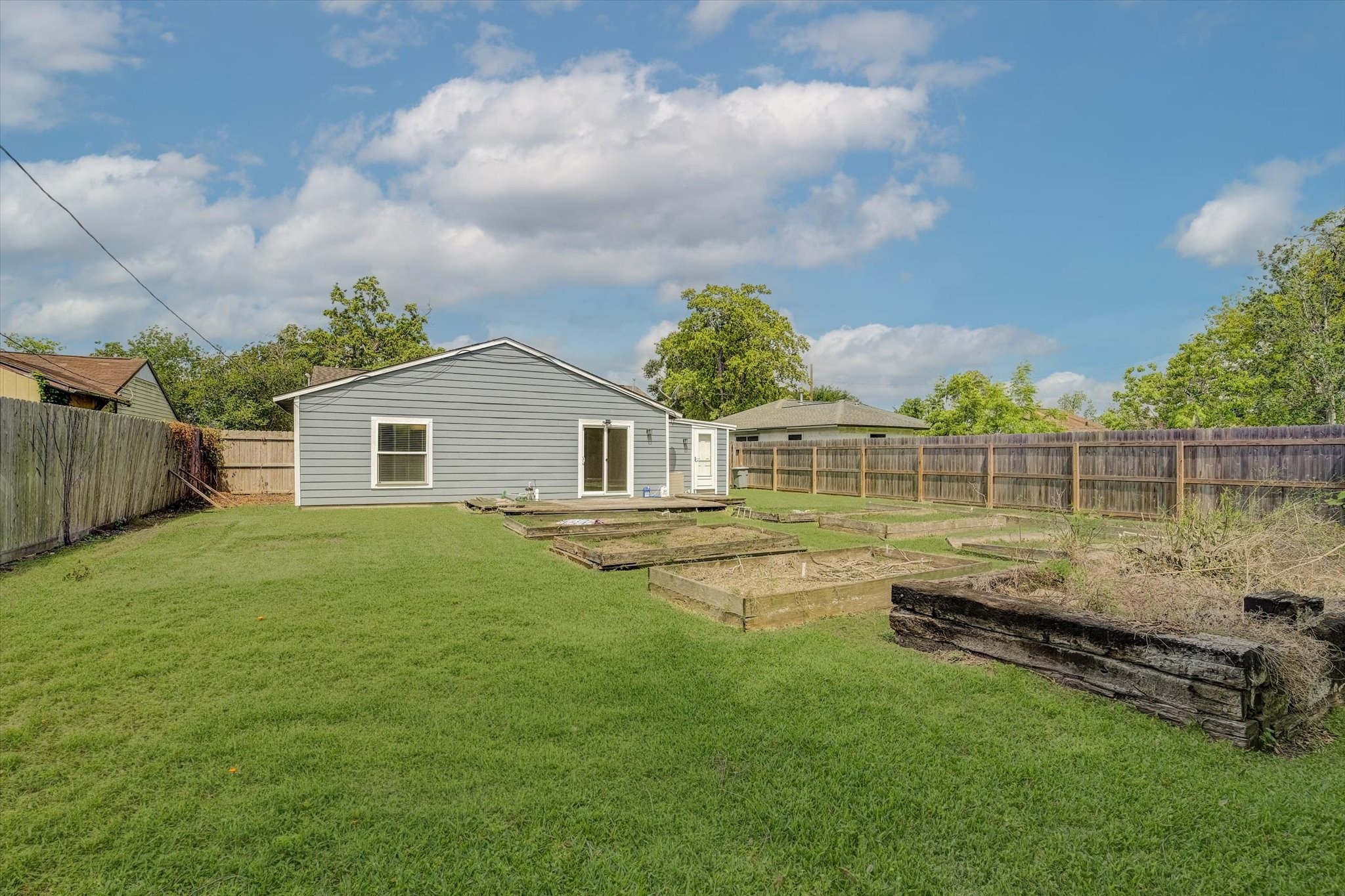 413 Farrer Street Angleton, TX 77515 - Photo 42 of 43 a view of a house with a backyard