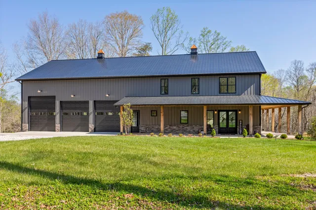 a view of a large body of water with a building in the background