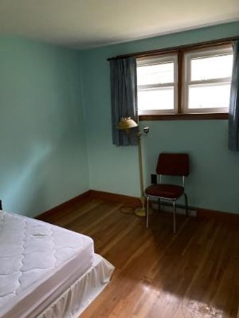 14 Lawrence Road Haverhill, MA 01835 - Photo 11 of 14 a bedroom with a bed and a window
