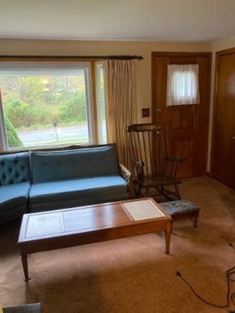 14 Lawrence Road Haverhill, MA 01835 - Photo 9 of 14 a living room with a bed furniture and a window