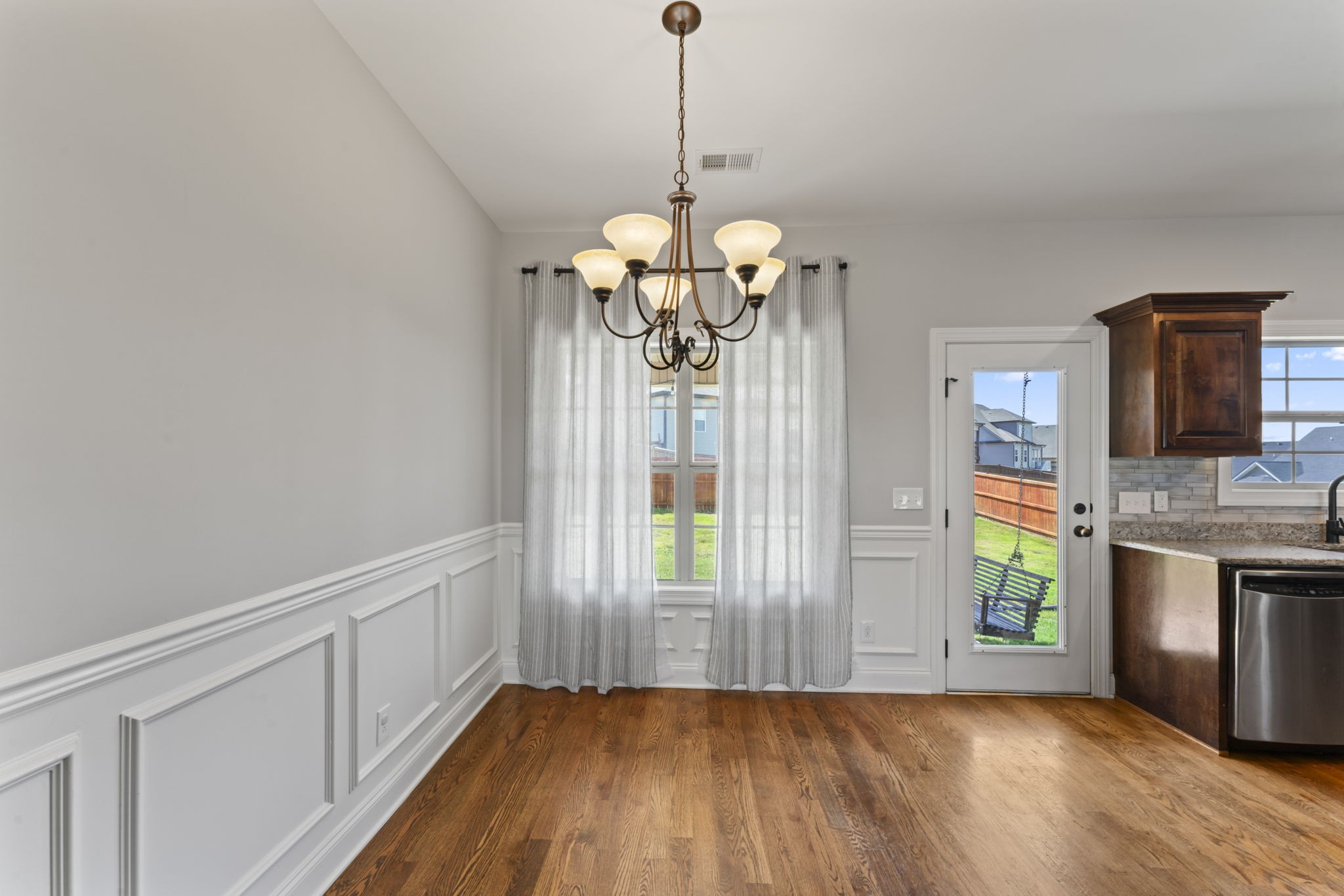 2314 Tranquility Trail Smyrna, TN 37167 - Photo 11 of 35 a view of an empty room with window and wooden floor