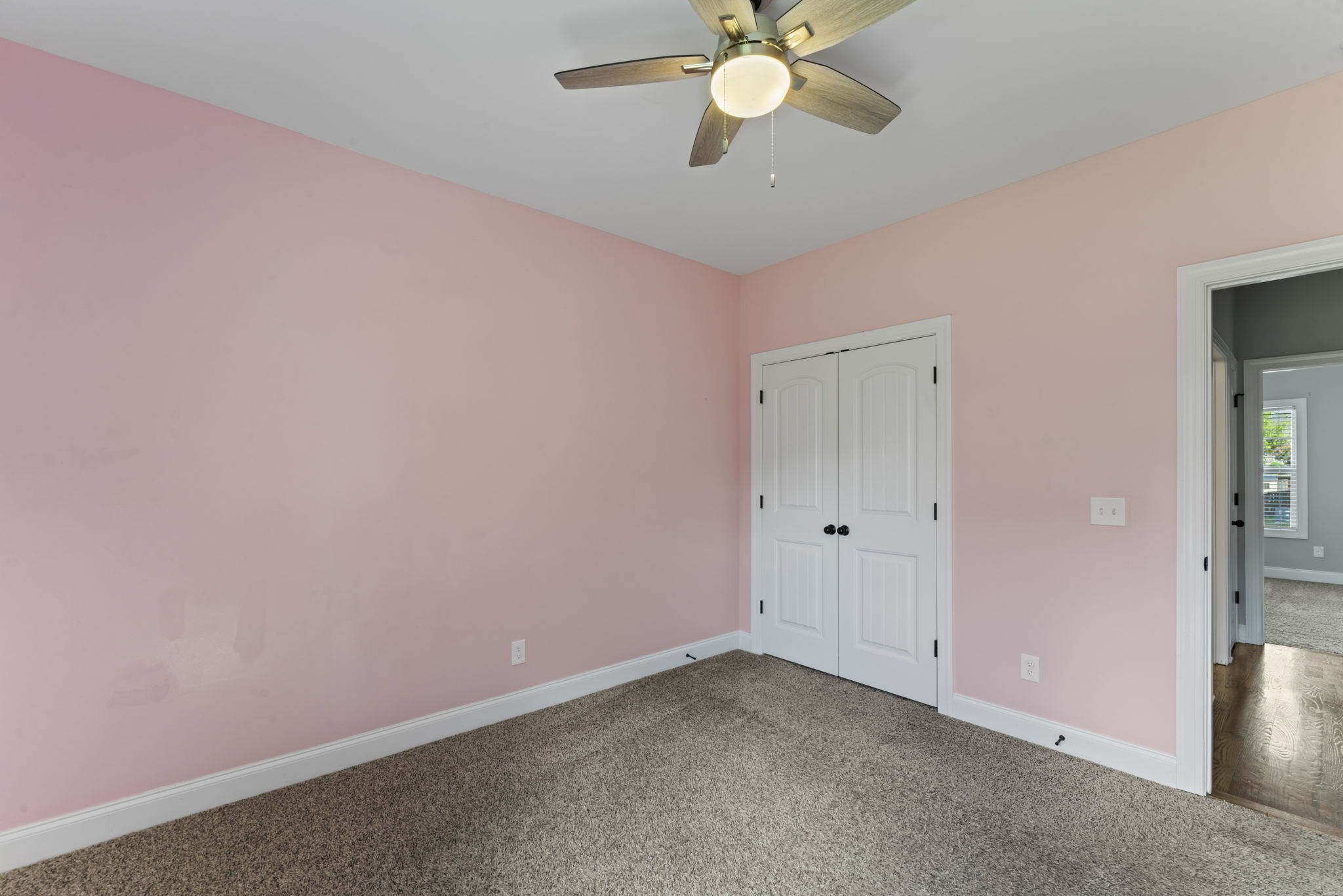 2314 Tranquility Trail Smyrna, TN 37167 - Photo 18 of 35 an empty room with a chandelier fan and a chandelier fan