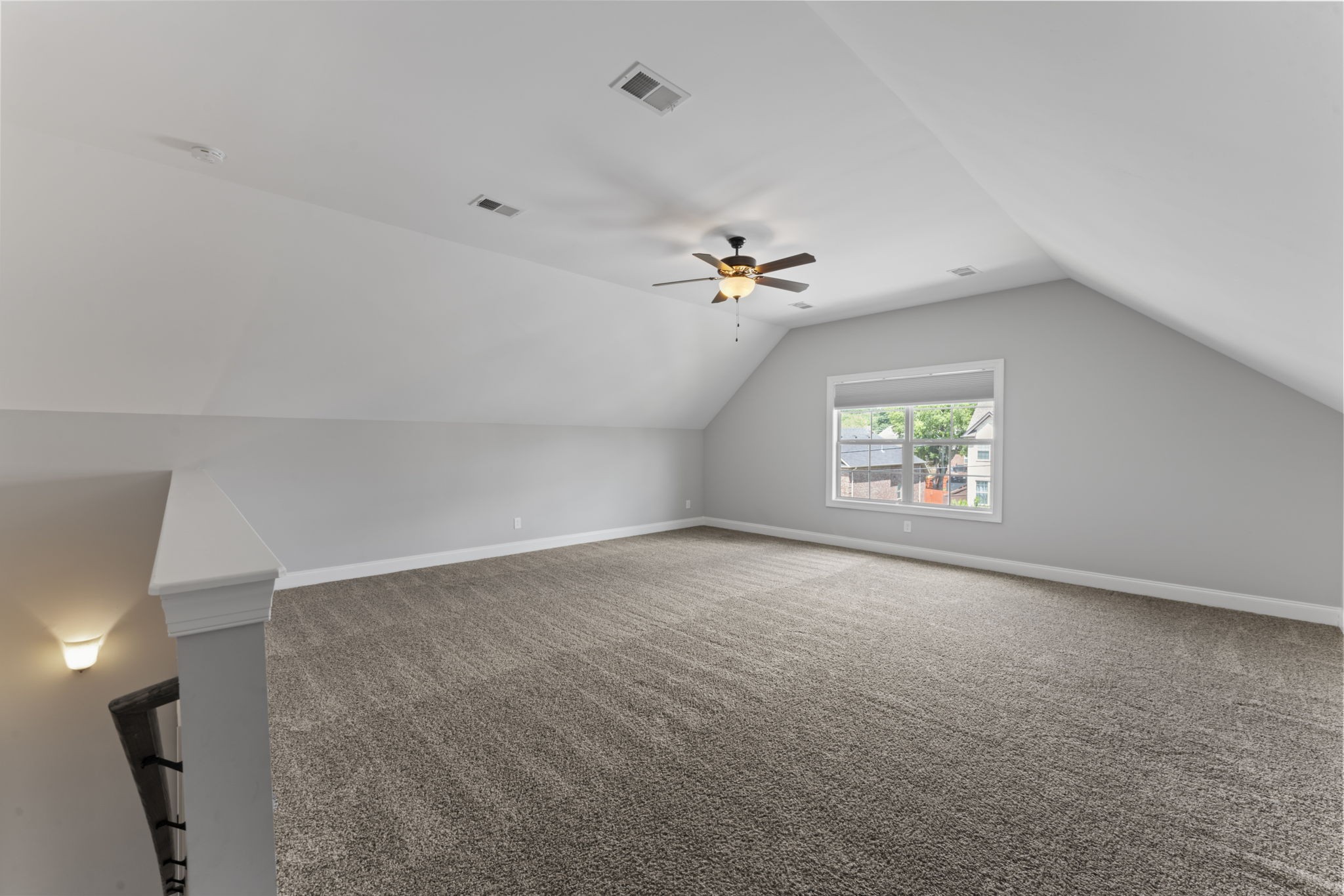 2314 Tranquility Trail Smyrna, TN 37167 - Photo 24 of 35 an empty room with windows and chandelier fan