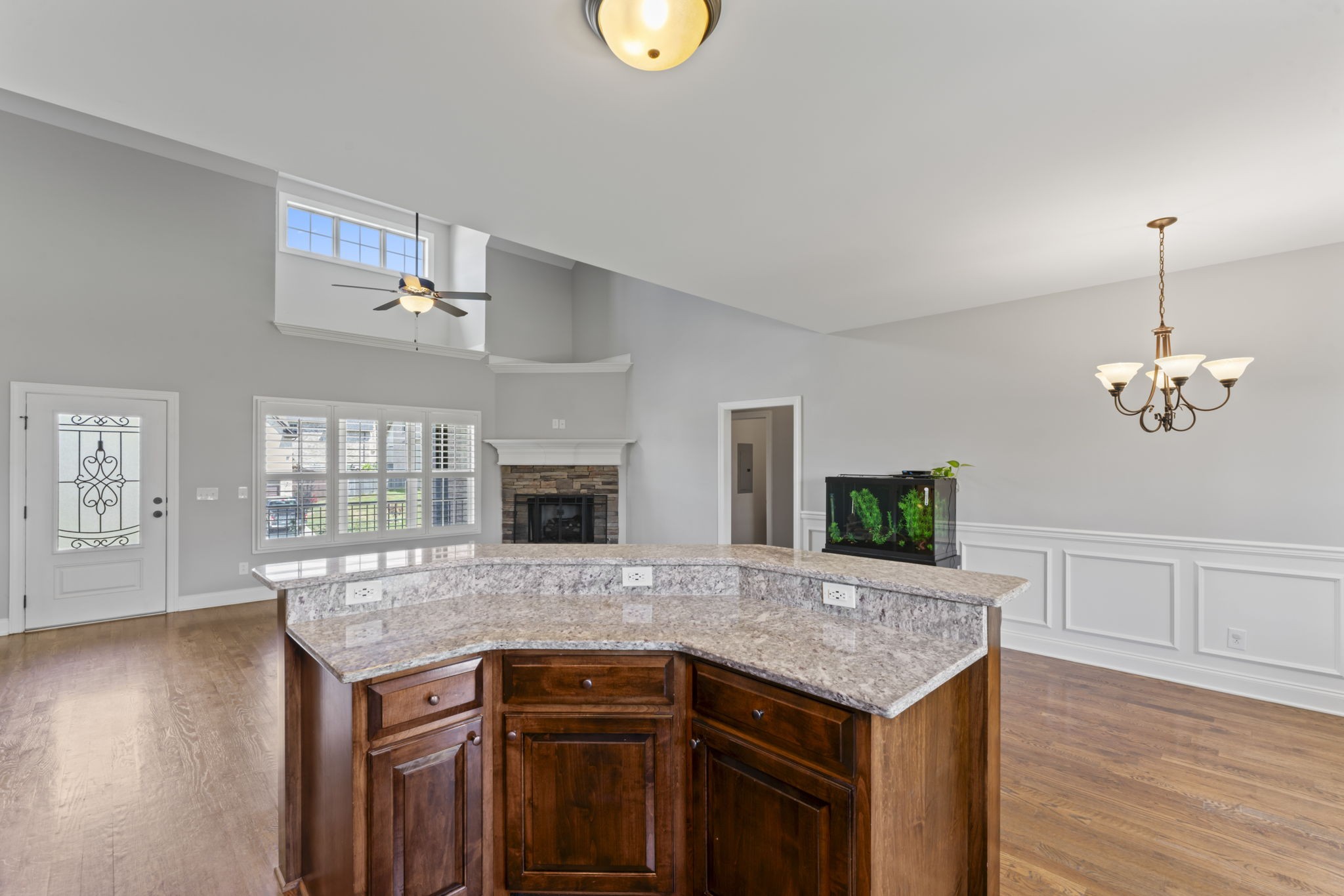 2314 Tranquility Trail Smyrna, TN 37167 - Photo 5 of 35 a kitchen with kitchen island granite countertop a stove and a wooden floors