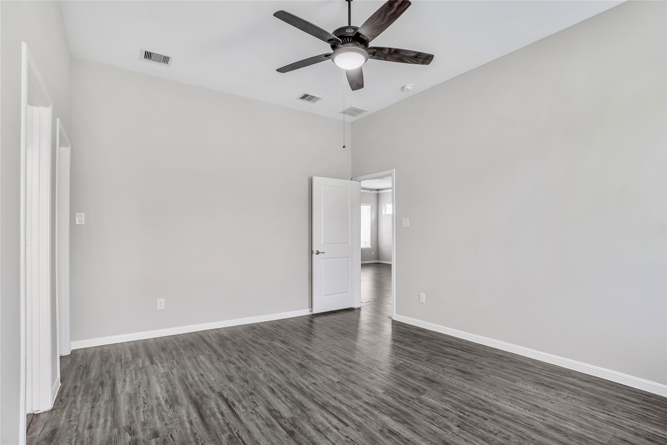 6532 Geisler Crossing Lane League City, TX 77539 - Photo 16 of 28 wooden floor in an empty room