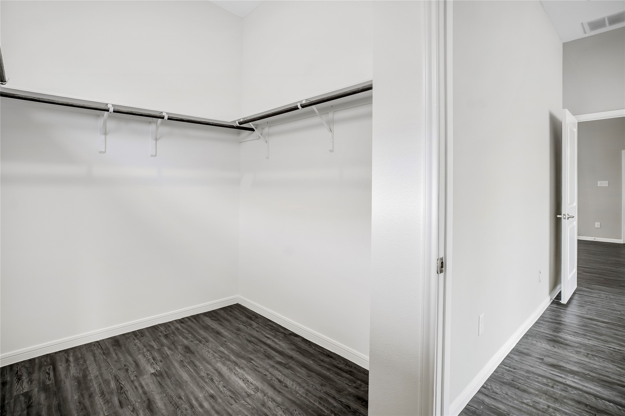6532 Geisler Crossing Lane League City, TX 77539 - Photo 18 of 28 a view of a hallway with wooden floor