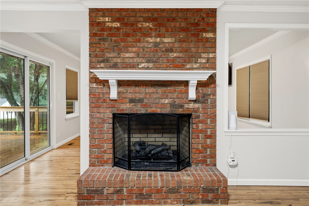 1014 East Queen Street Pendleton, SC 29670 - Photo 20 of 43 An inviting hearth of exposed brick, offering warmth and character.