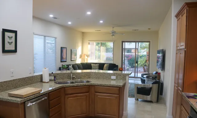 a kitchen with a sink and stove