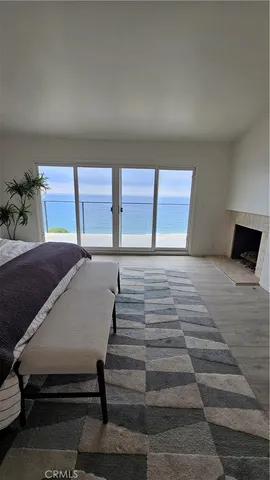 a kitchen with a sink and a mirror