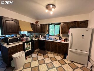 33145 Southeast Compton Road Boring, OR 97009 - Photo 16 of 17 a kitchen with a sink appliances and cabinets