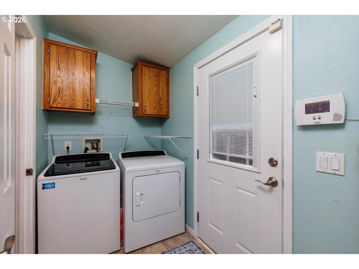 2329 North Gray Street Cornelius, OR 97113 - Photo 11 of 27 a view of kitchen and utility room