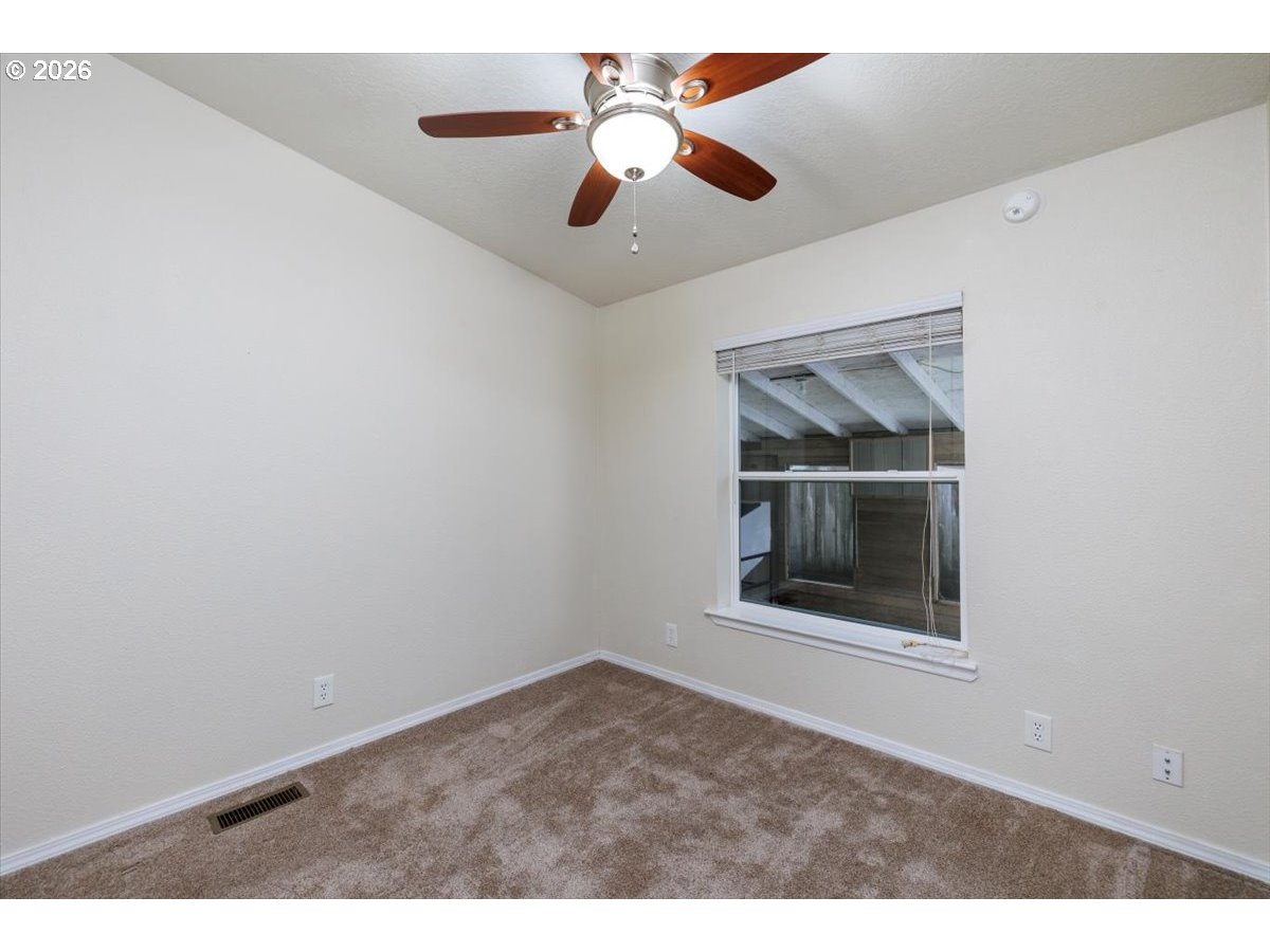 2329 North Gray Street Cornelius, OR 97113 - Photo 13 of 27 a view of empty room with ceiling fan