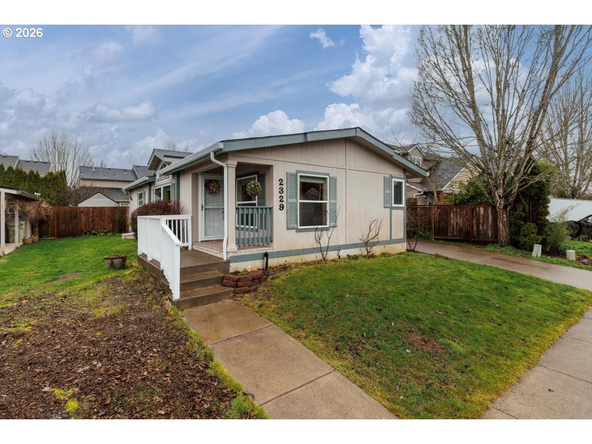 2329 North Gray Street Cornelius, OR 97113 - Photo 2 of 27 a view of a house with a yard