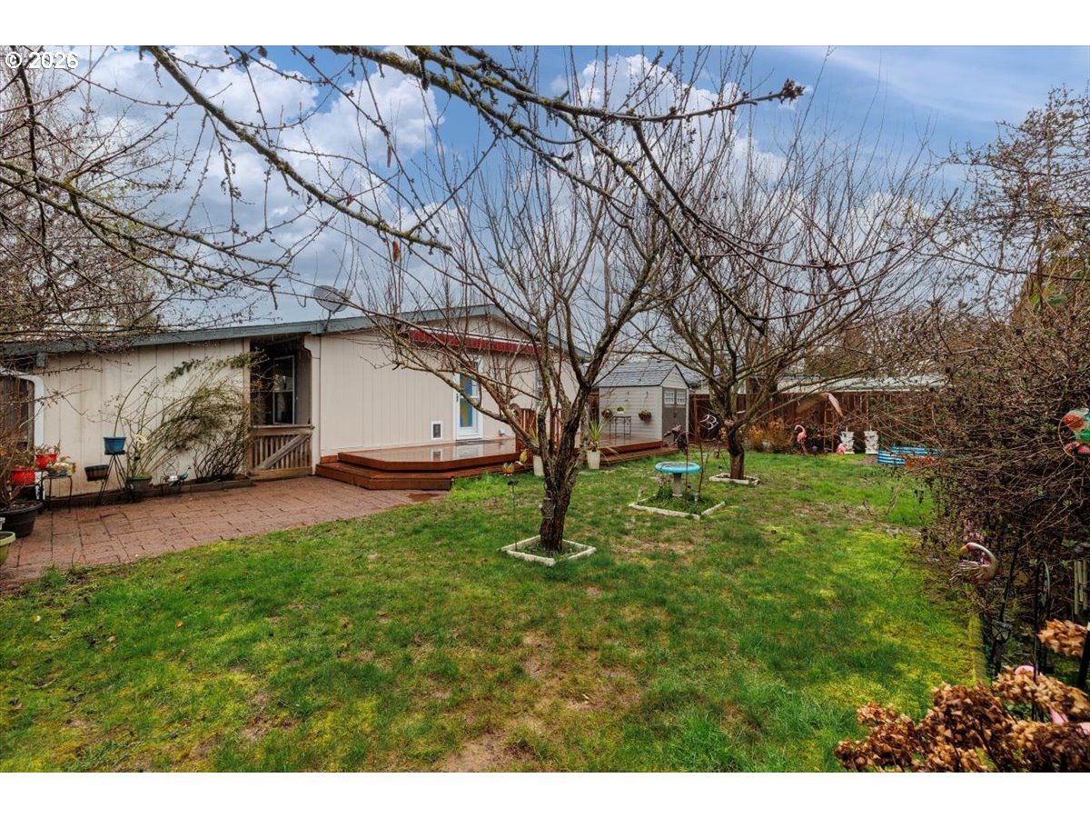 2329 North Gray Street Cornelius, OR 97113 - Photo 23 of 27 a view of an house with backyard space and garden
