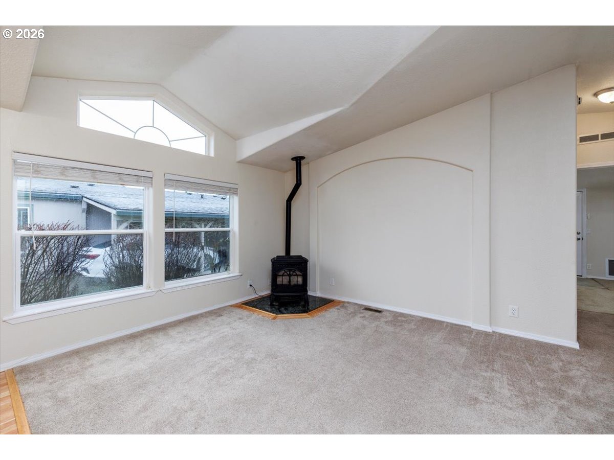 2329 North Gray Street Cornelius, OR 97113 - Photo 6 of 27 a view of an empty room with a window