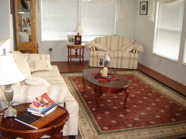 15240 Fisk Road Yakima, WA 98908 - Photo 12 of 13 a living room with table and chairs