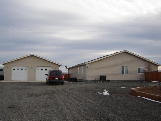 15240 Fisk Road Yakima, WA 98908 - Photo 3 of 13 a view of a house with backyard