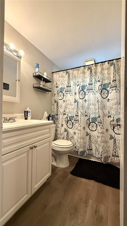 111 Palencia Road Auburndale, FL 33823 - Photo 13 of 28 a bathroom with a sink toilet and shower