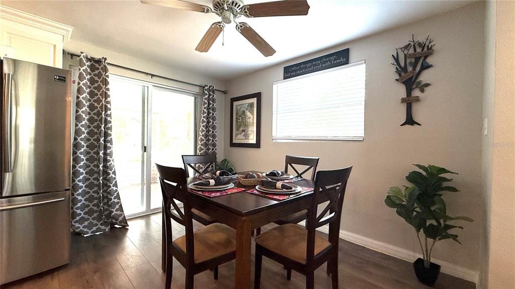 111 Palencia Road Auburndale, FL 33823 - Photo 17 of 28 a dining room with furniture window and wooden floor