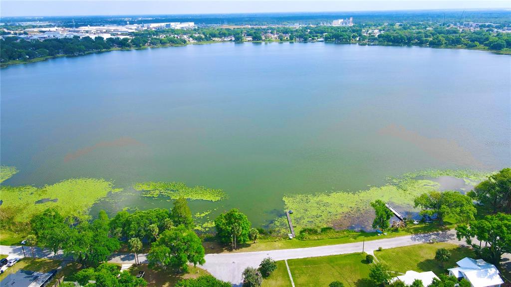 111 Palencia Road Auburndale, FL 33823 - Photo 28 of 28 an aerial view of ocean with residential house with outdoor space and seating