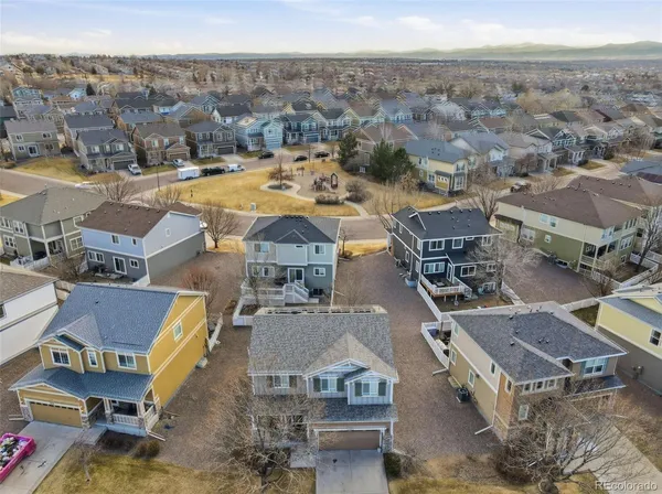 an aerial view of a house with a outdoor space
