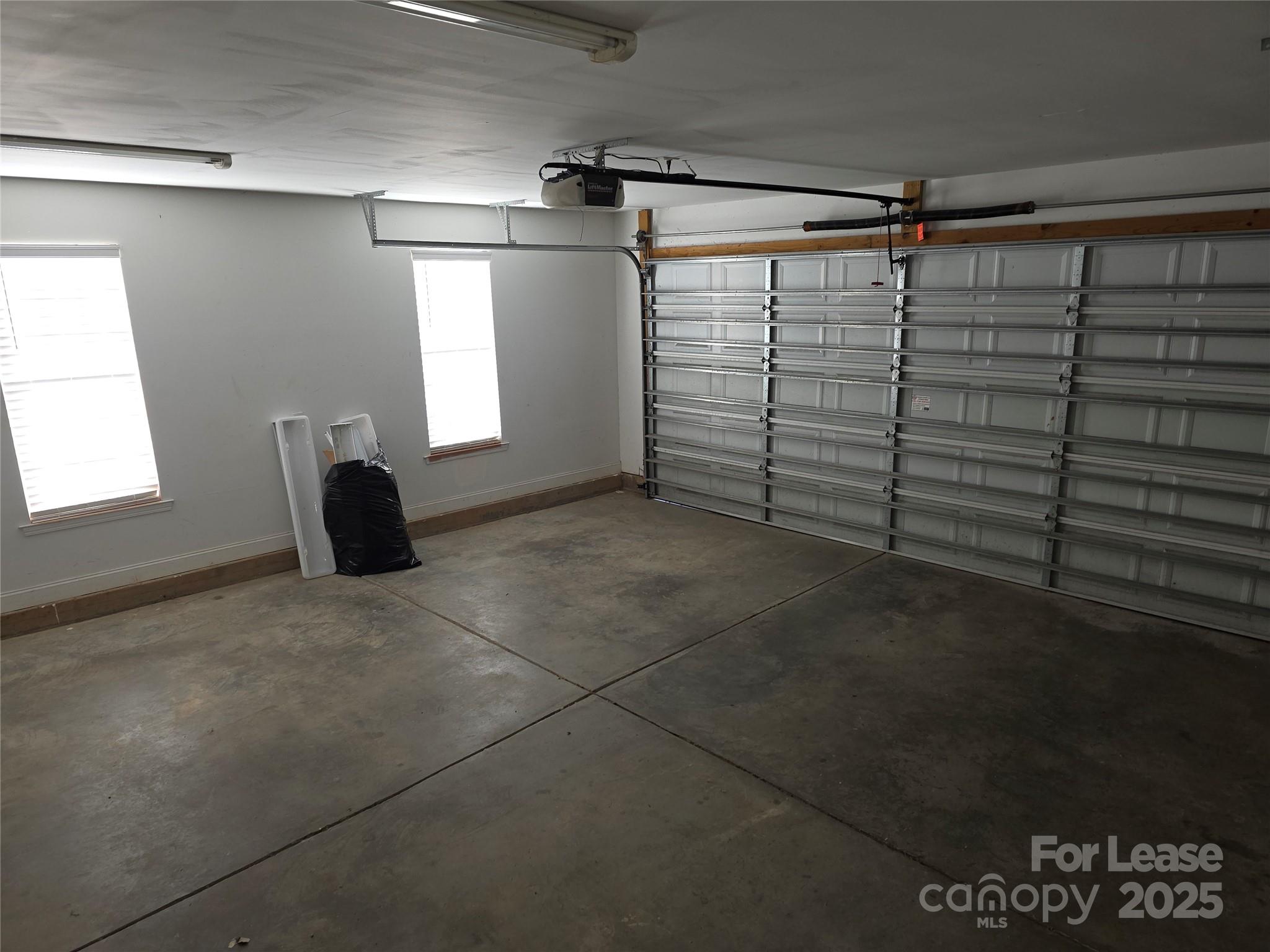 1682 Lane Road Mount Holly, NC 28120 - Photo 26 of 32 a view of empty room with windows