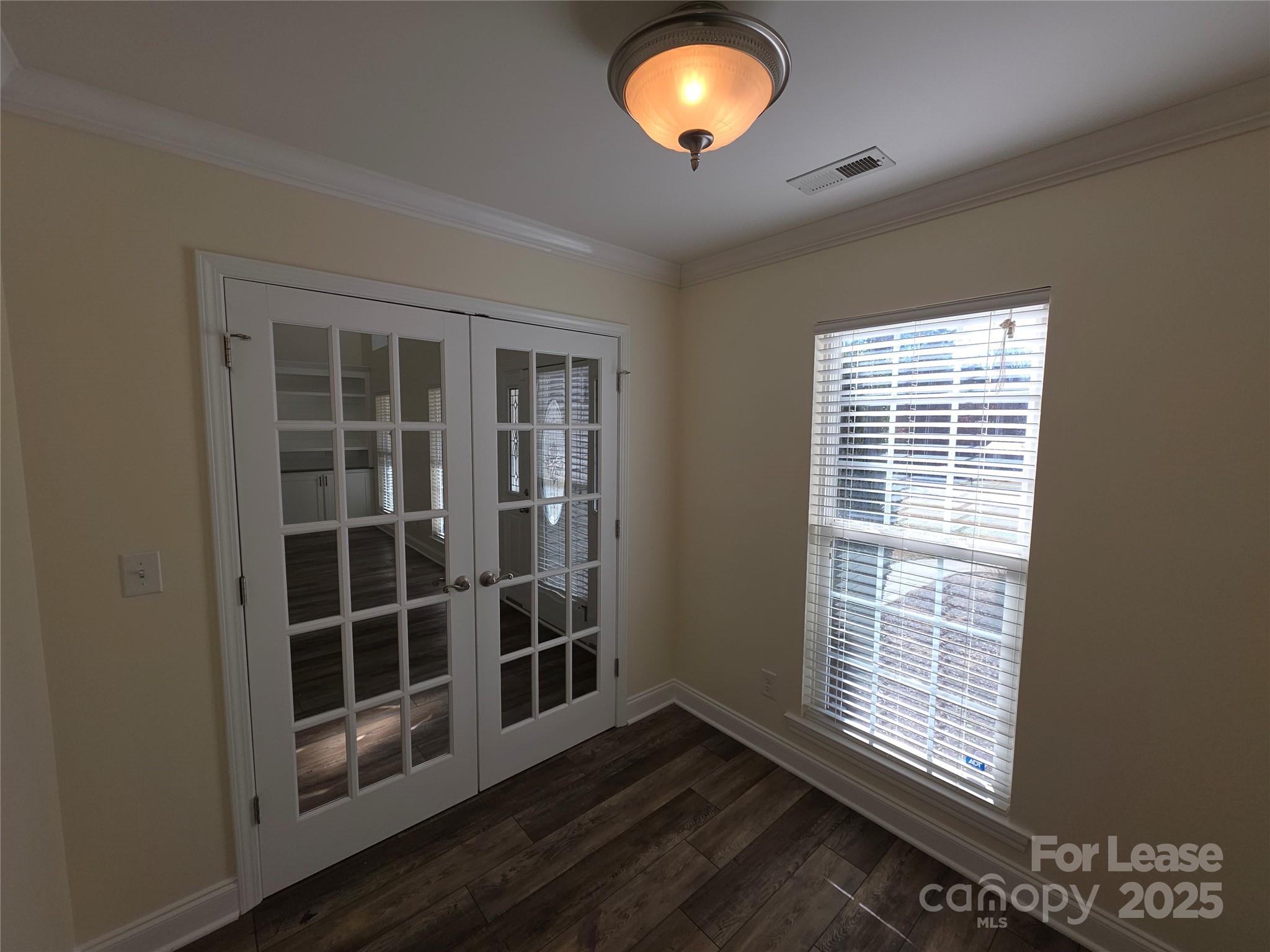 1682 Lane Road Mount Holly, NC 28120 - Photo 10 of 32 a view of wooden floor and windows in a room