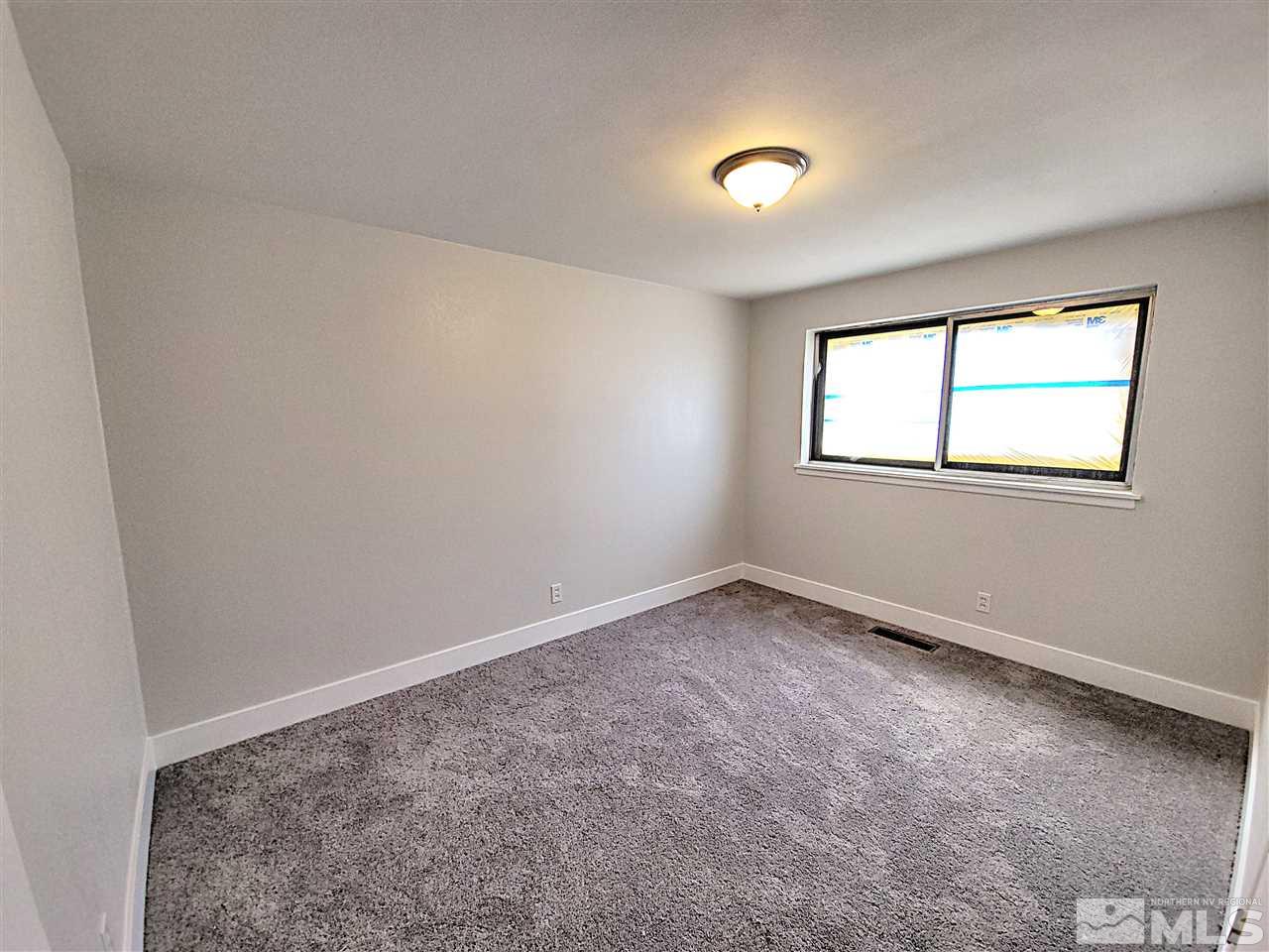 1901 Carlin Street Reno, NV 89503 - Photo 7 of 10 an empty room with a window