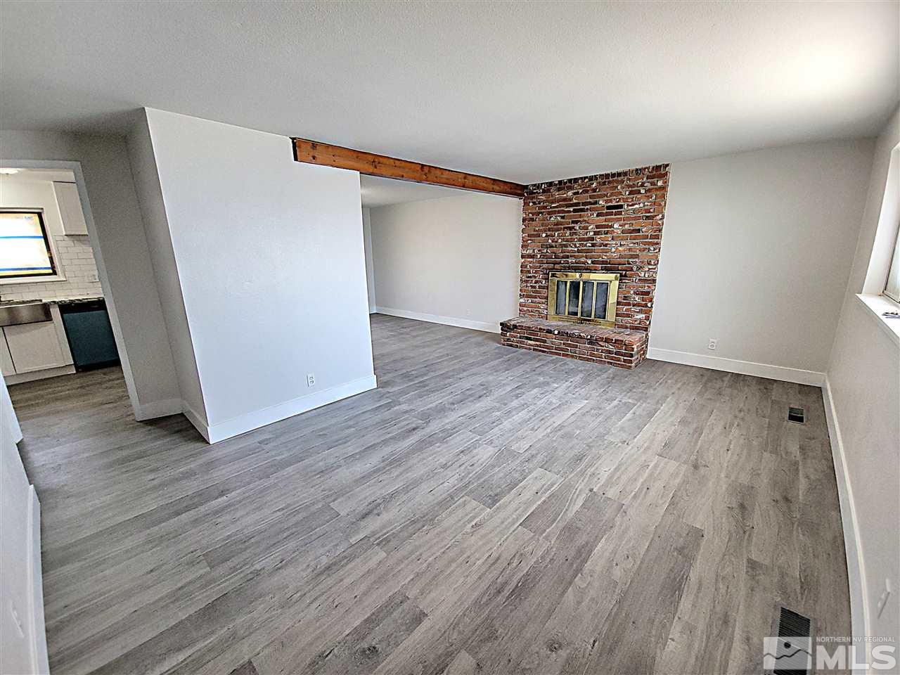 1901 Carlin Street Reno, NV 89503 - Photo 10 of 10 wooden floor in an empty room with a window
