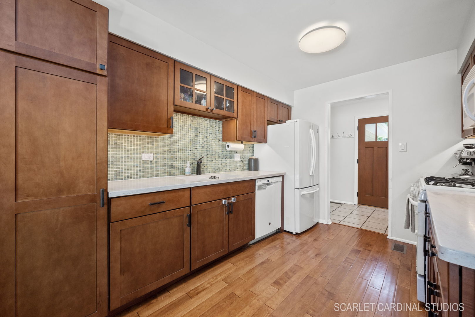 1215 Windsor Drive Wheaton, IL 60189 - Photo 11 of 32 a spacious bathroom with a double vanity sink a mirror and a shower