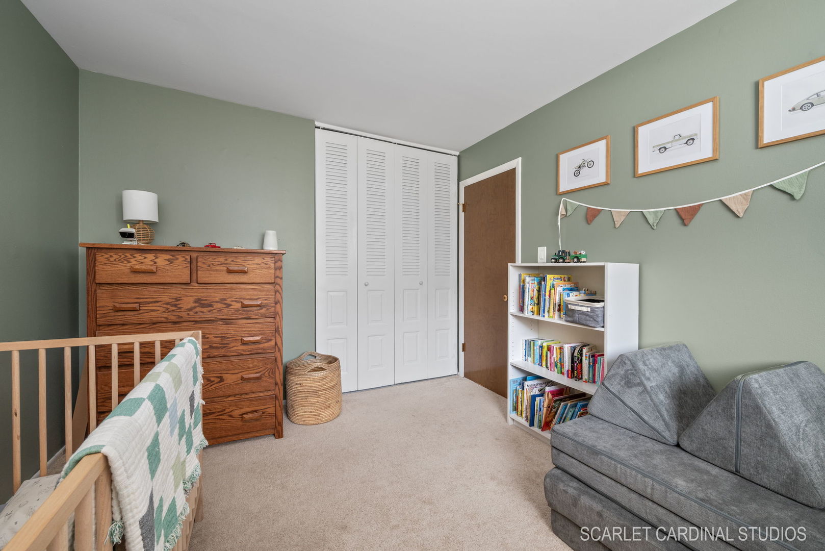 1215 Windsor Drive Wheaton, IL 60189 - Photo 18 of 32 a living room with furniture and a book shelf