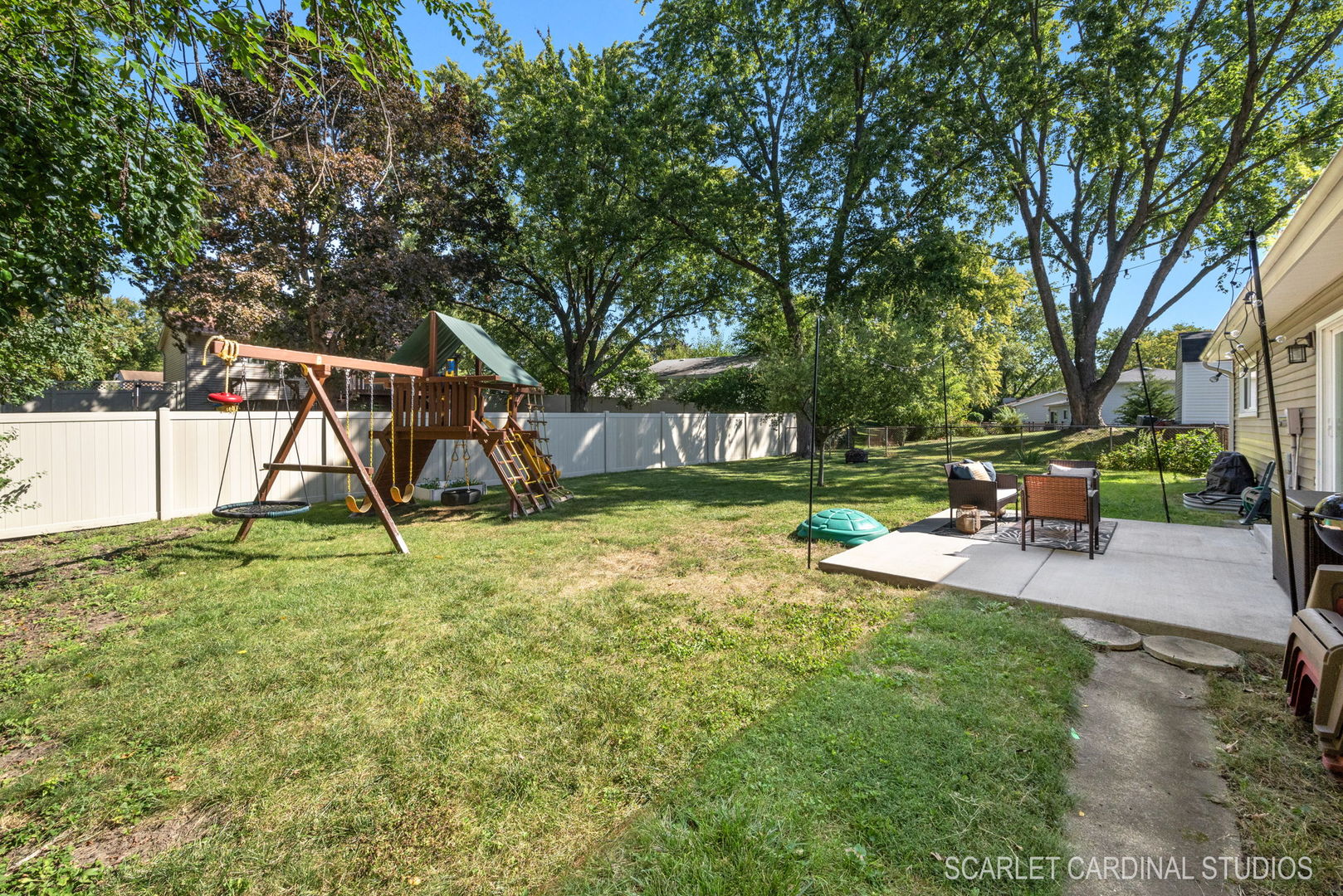 1215 Windsor Drive Wheaton, IL 60189 - Photo 21 of 32 a view of a park with swings and slides