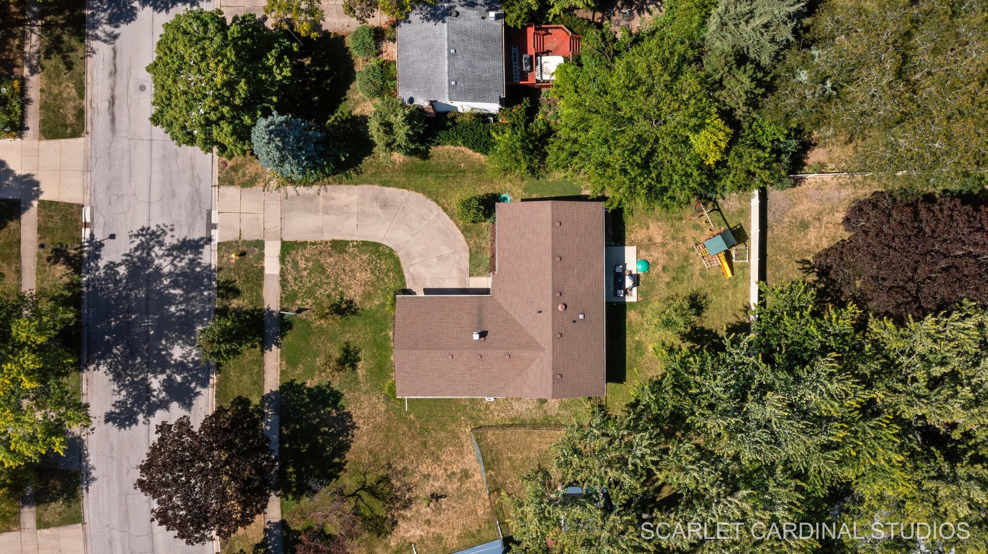 1215 Windsor Drive Wheaton, IL 60189 - Photo 27 of 32 an aerial view of a house with outdoor space and trees all around
