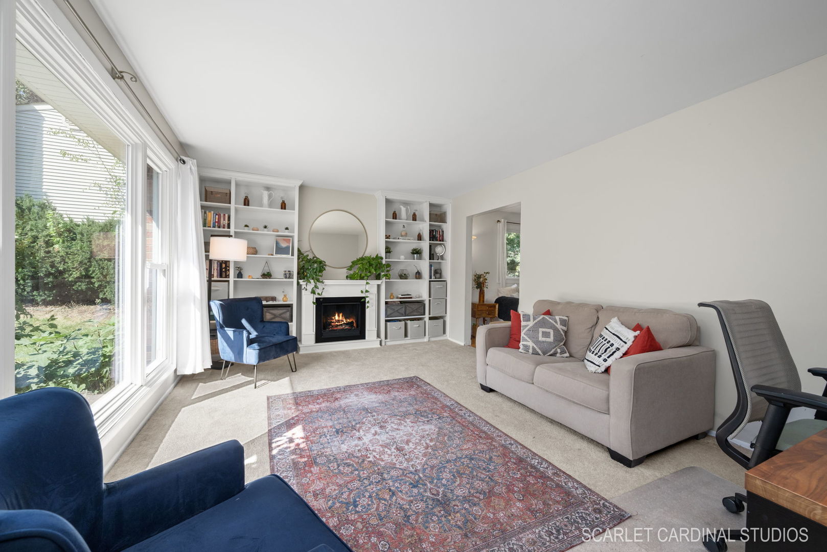 1215 Windsor Drive Wheaton, IL 60189 - Photo 3 of 32 a living room with furniture and a fireplace