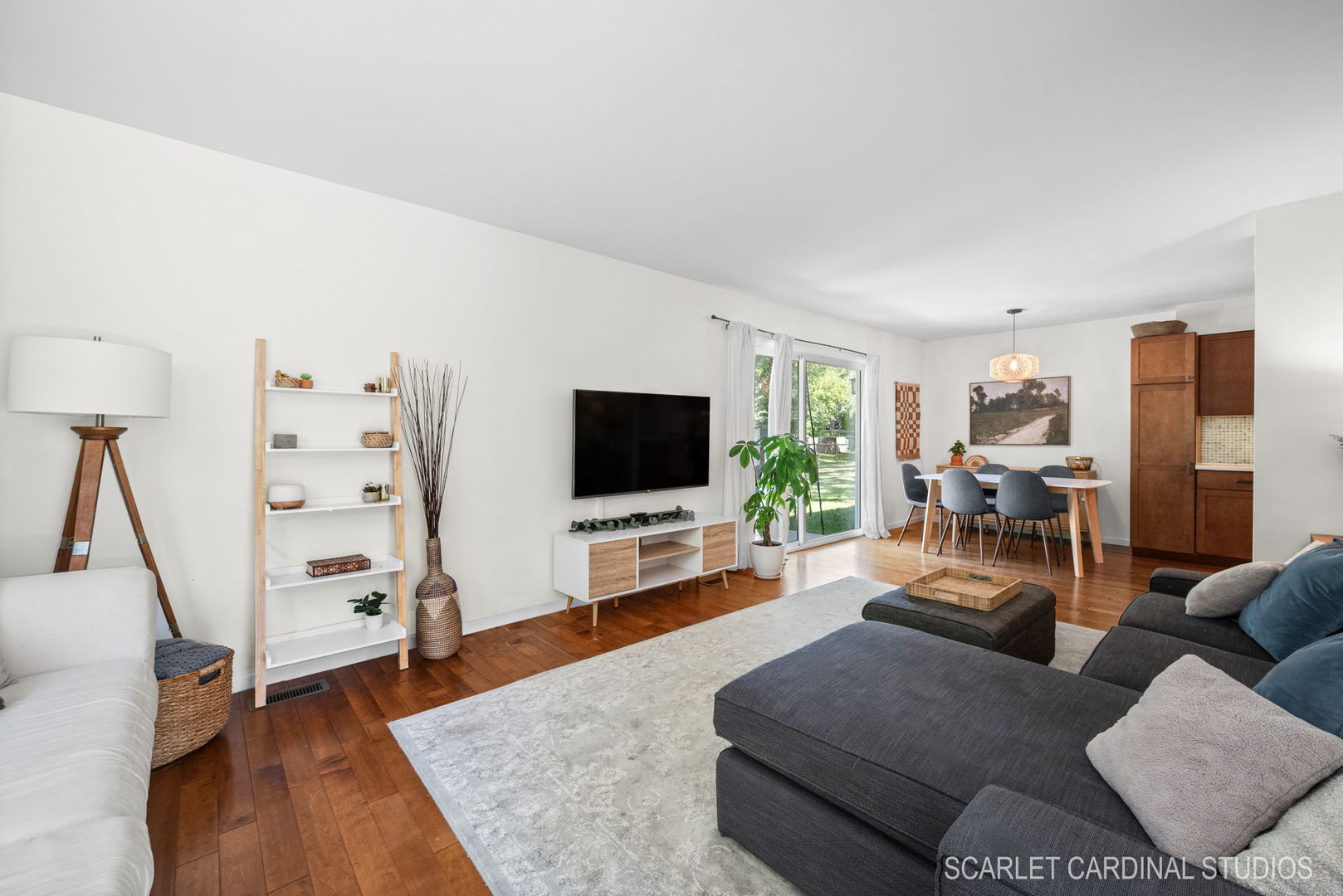 1215 Windsor Drive Wheaton, IL 60189 - Photo 7 of 32 a living room with furniture and a flat screen tv
