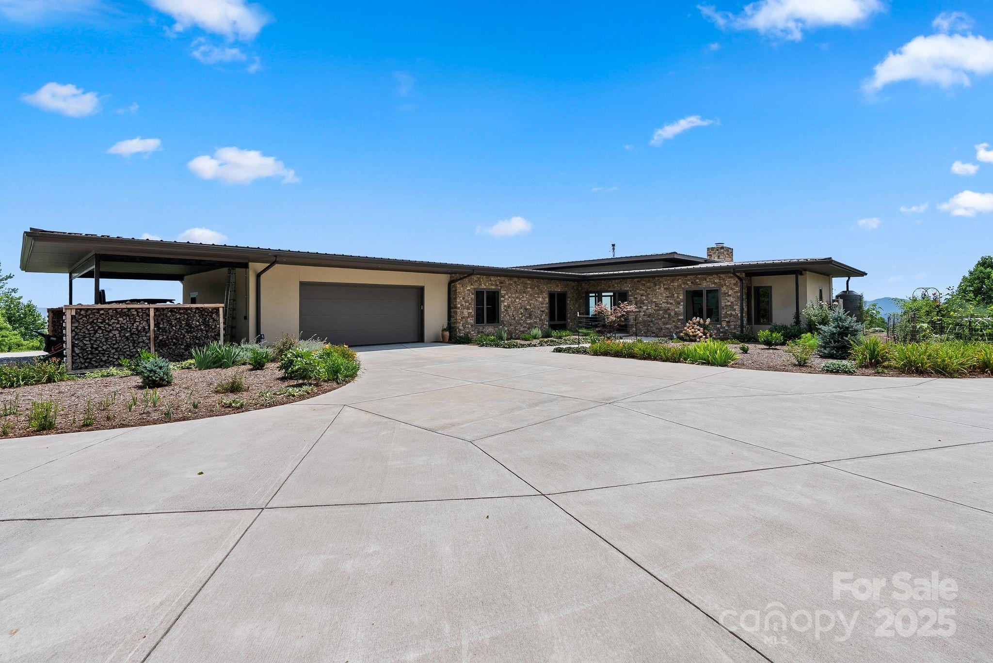 1045 Graham Road Marshall, NC 28753 - Photo 2 of 48 a view of house with yard and green space