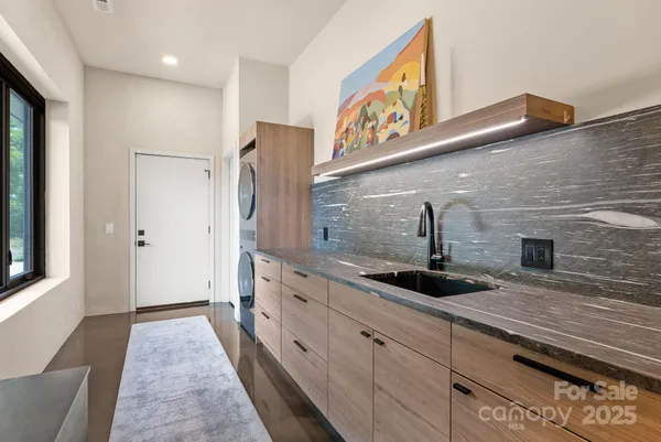 a bathroom with a sink and a shower